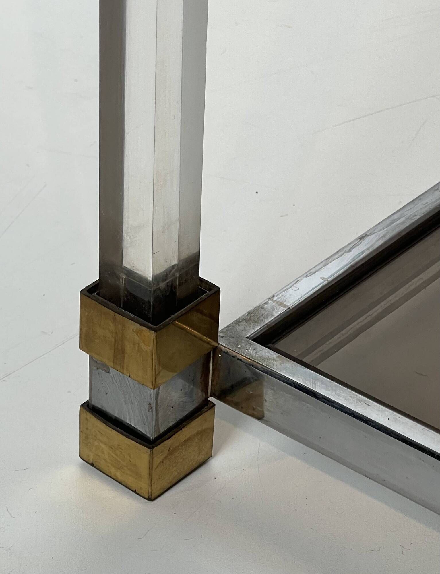 Lucite Shelf with Three Smoked Glass Shelves and Brass Ends. Work