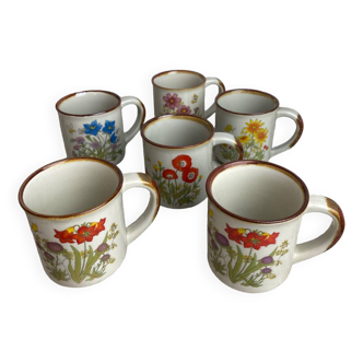 Six stoneware mugs with vintage floral decor