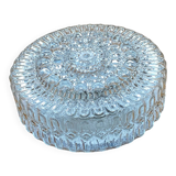 Large wall-mounted ceiling light with transparent glass.