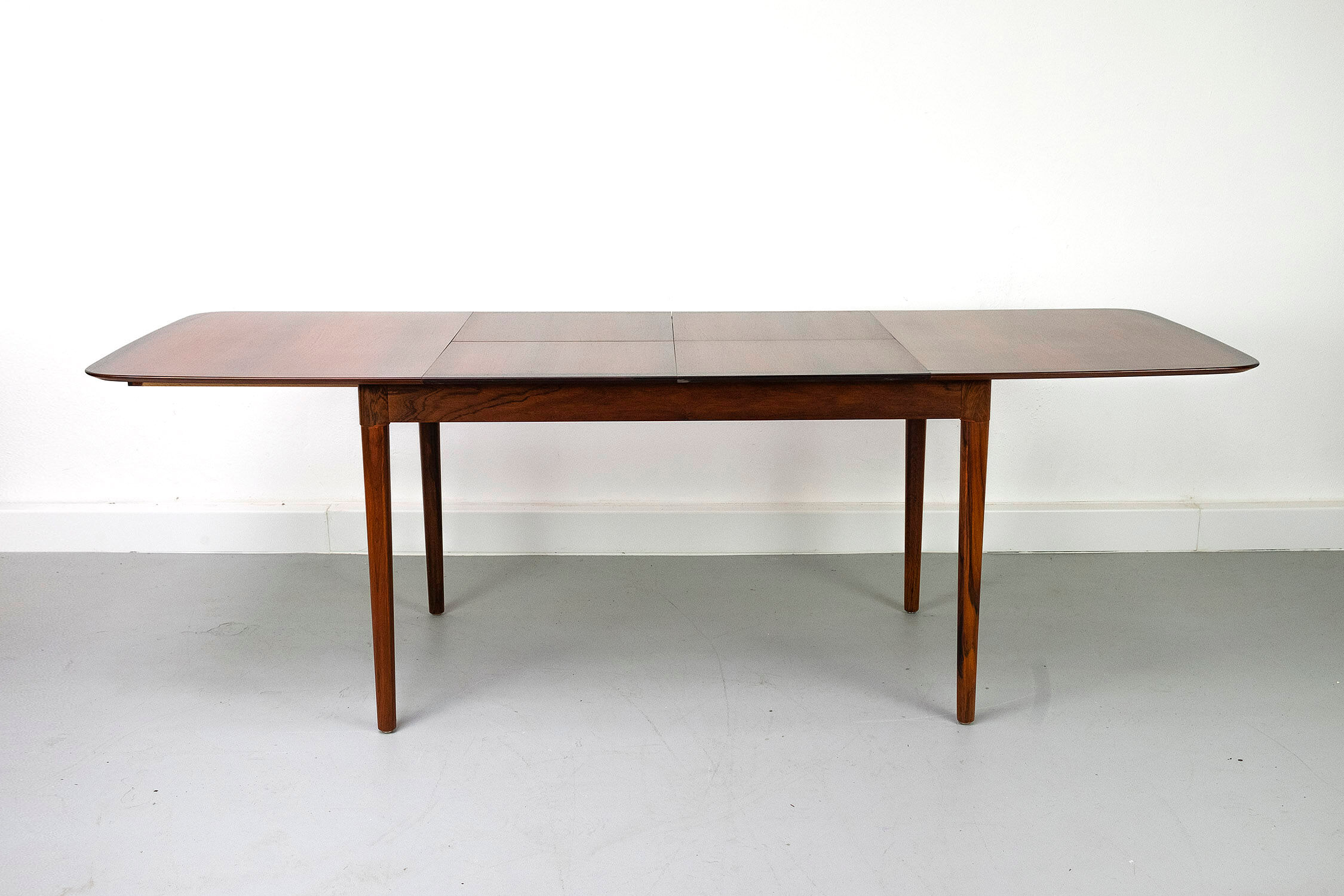 Extendable wooden dining table, manufactured by Lübke, Germany