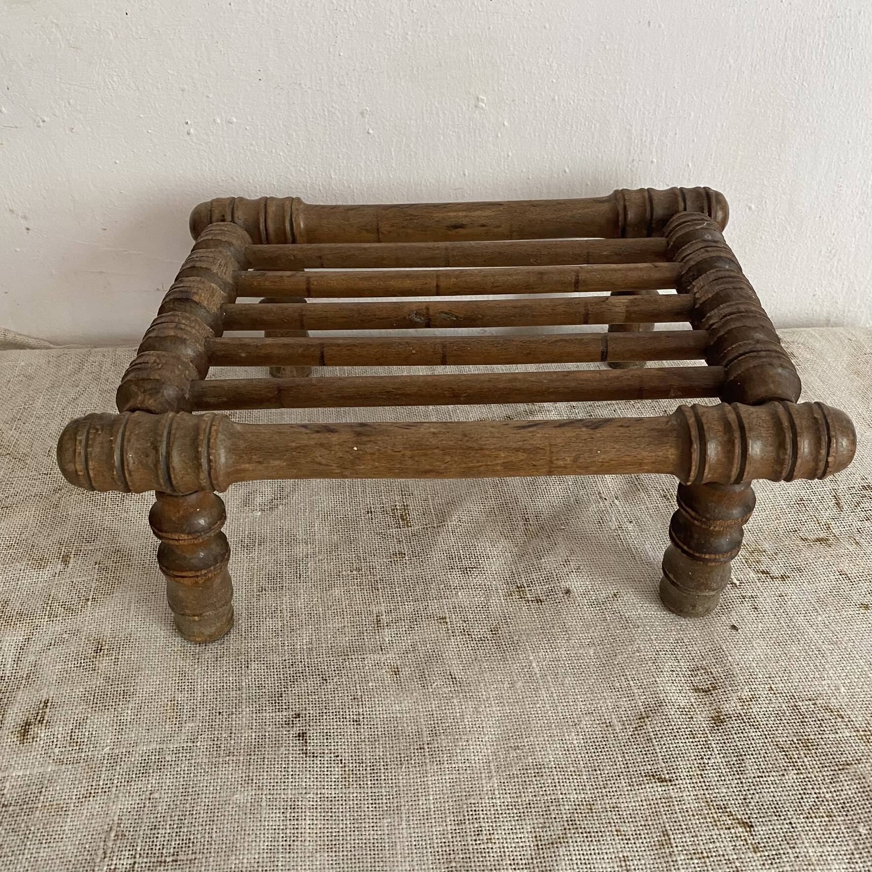 Old low turned wooden stool