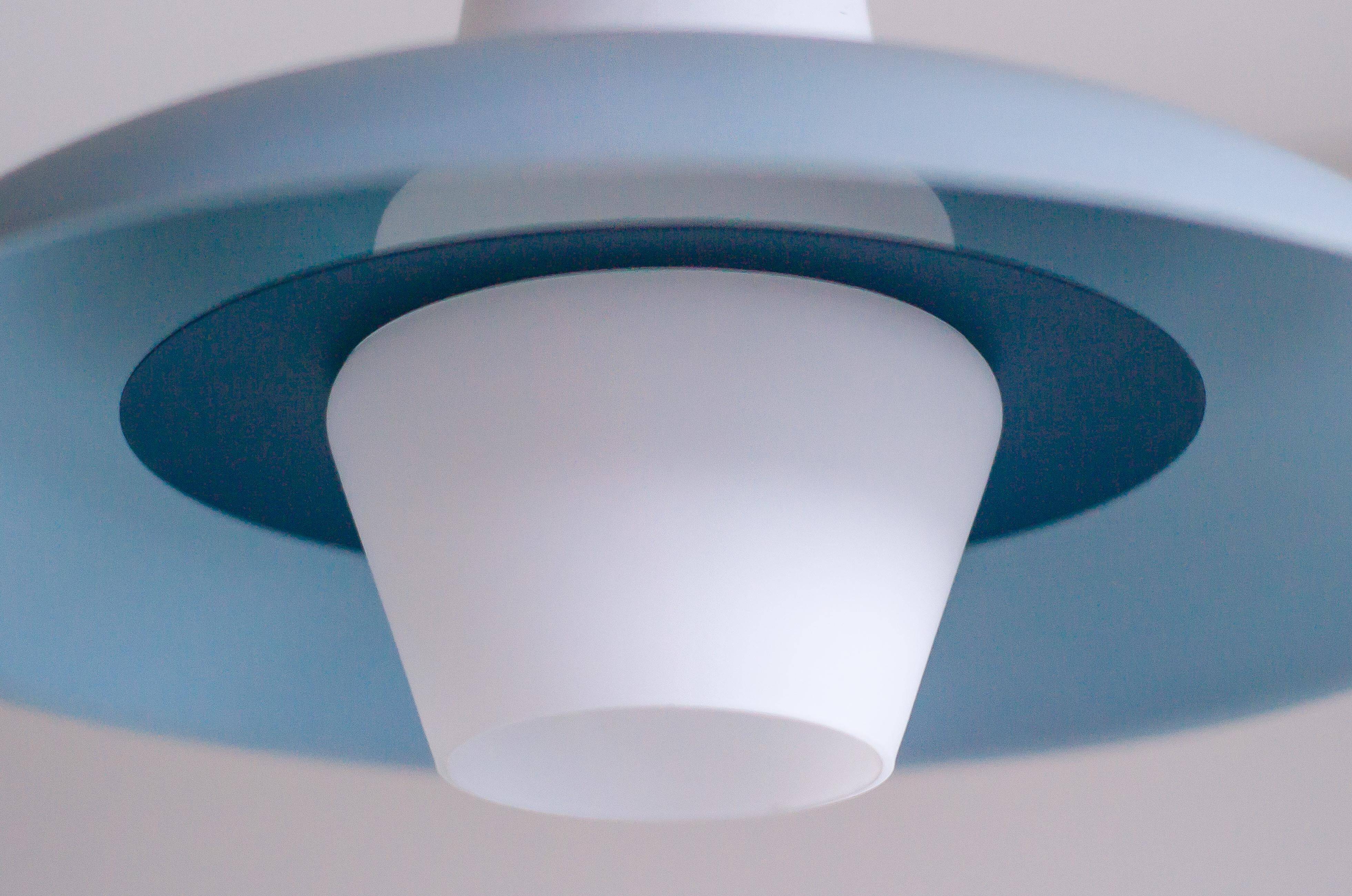 Philips pendant light in frosted sky blue glass by Louis Kalff