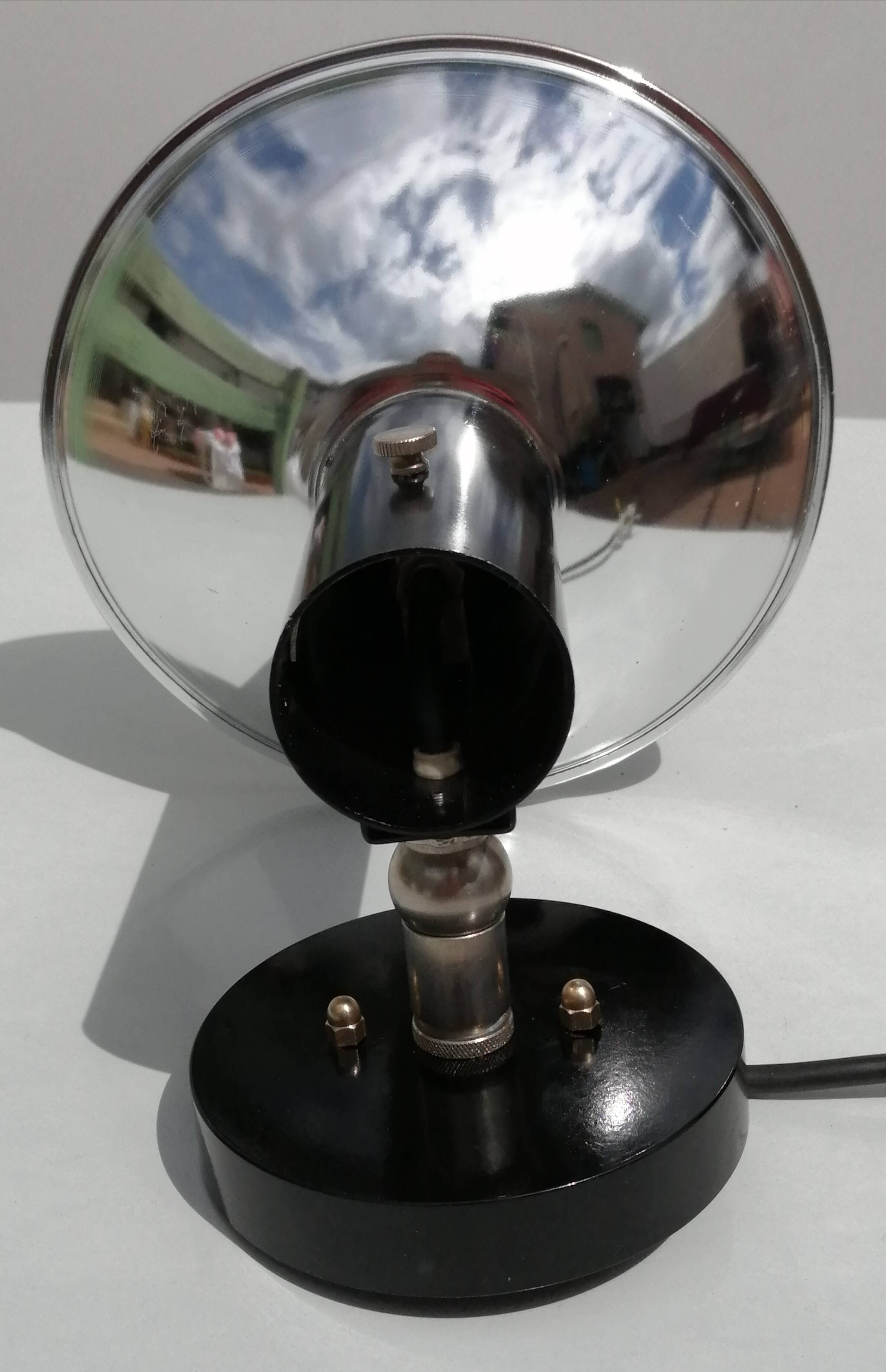 Adjustable black and chrome wall light from Raak, vintage 1960.