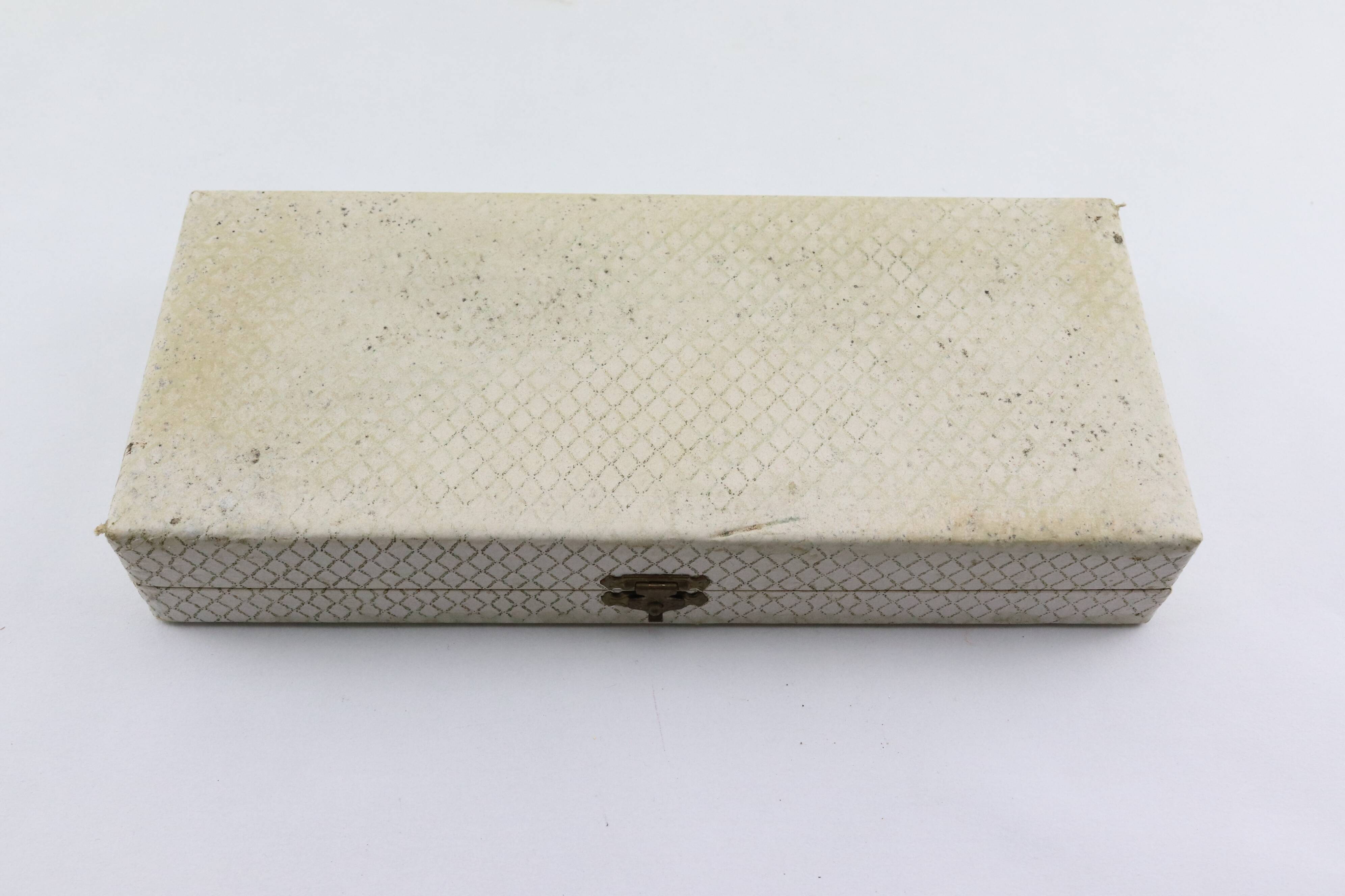 Old covered box in silver or silver metal spoon and fork with hallmarks