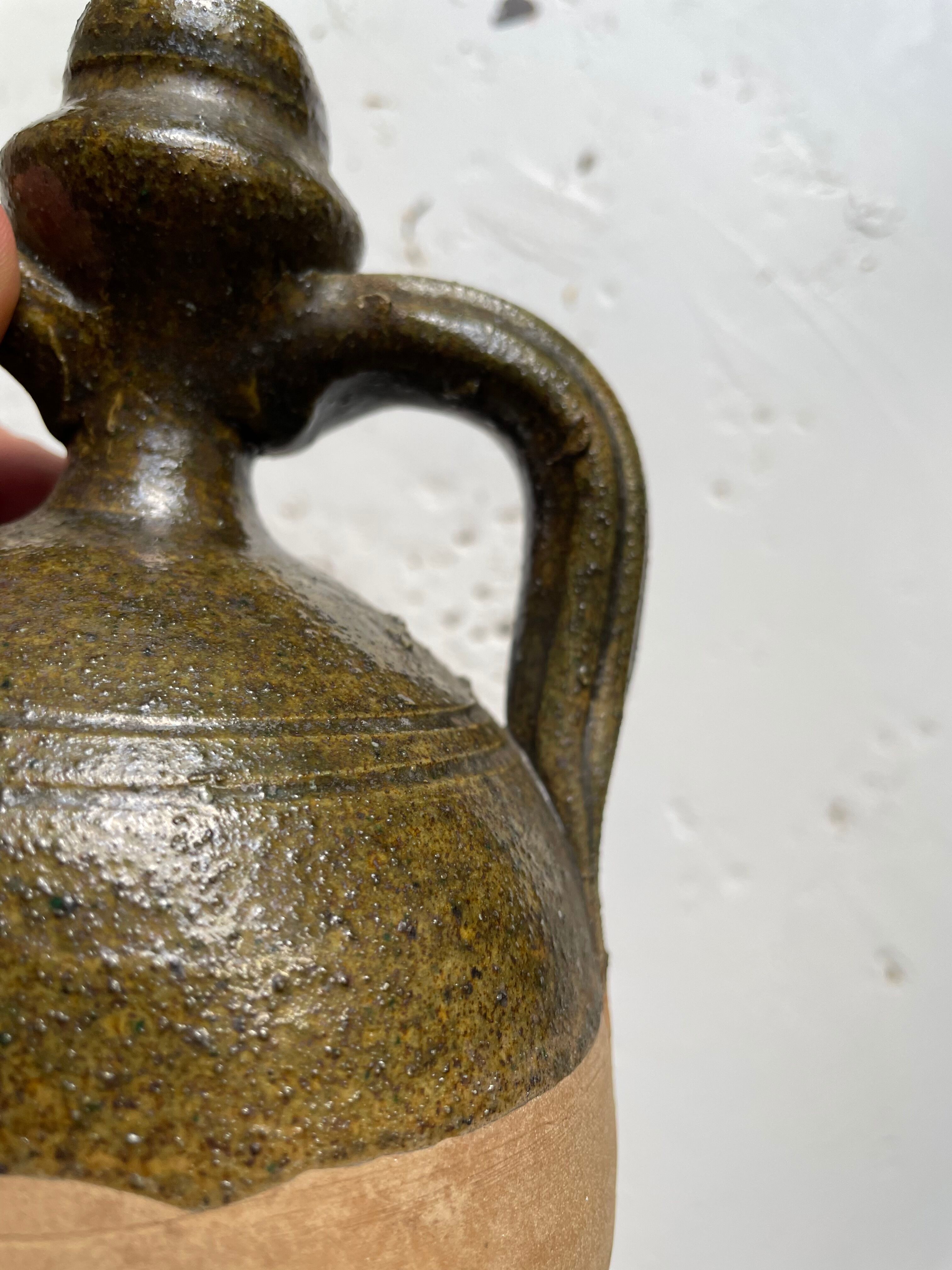 Persimmon glazed terracotta oil jar