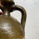Persimmon glazed terracotta oil jar