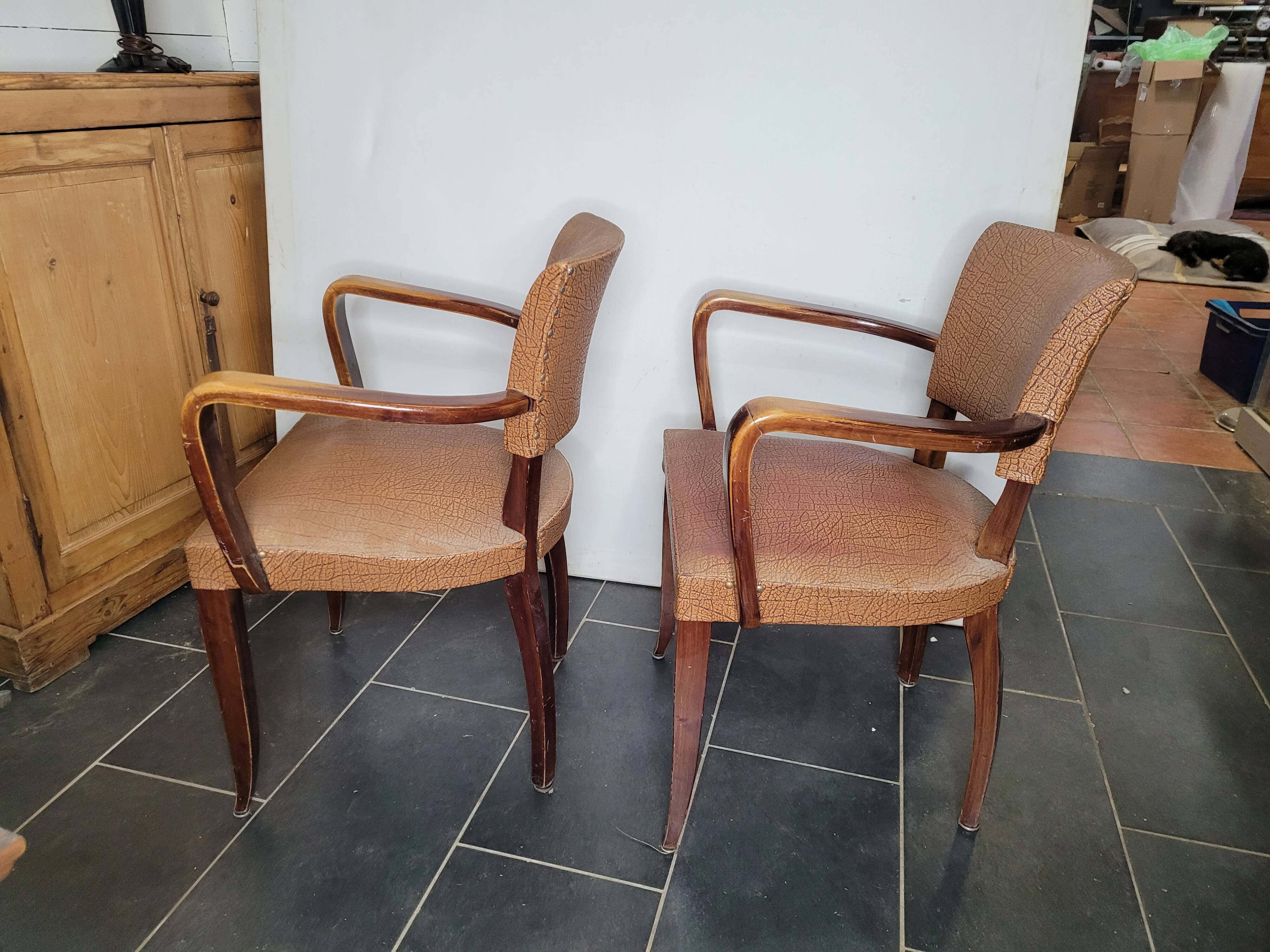 Pair of skai bridge armchairs