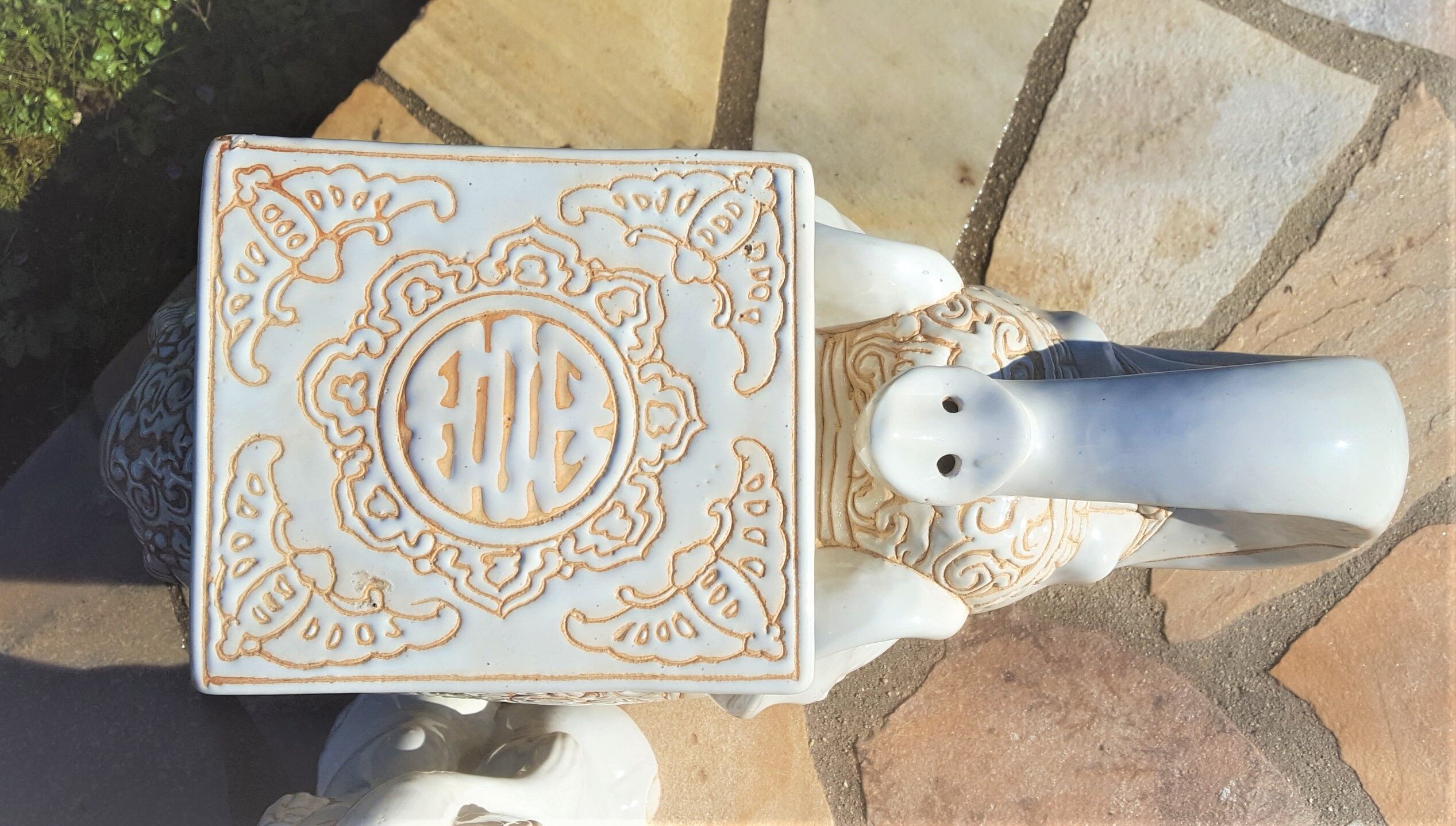 Pair of enamelled white ceramic elephant harnesses