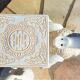 Pair of enamelled white ceramic elephant harnesses