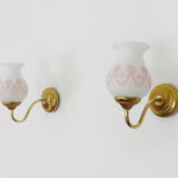 Pair of gooseneck wall sconces in gilded metal, white opaline with pink decorations