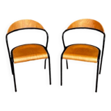 Pair of wooden and black metal chairs