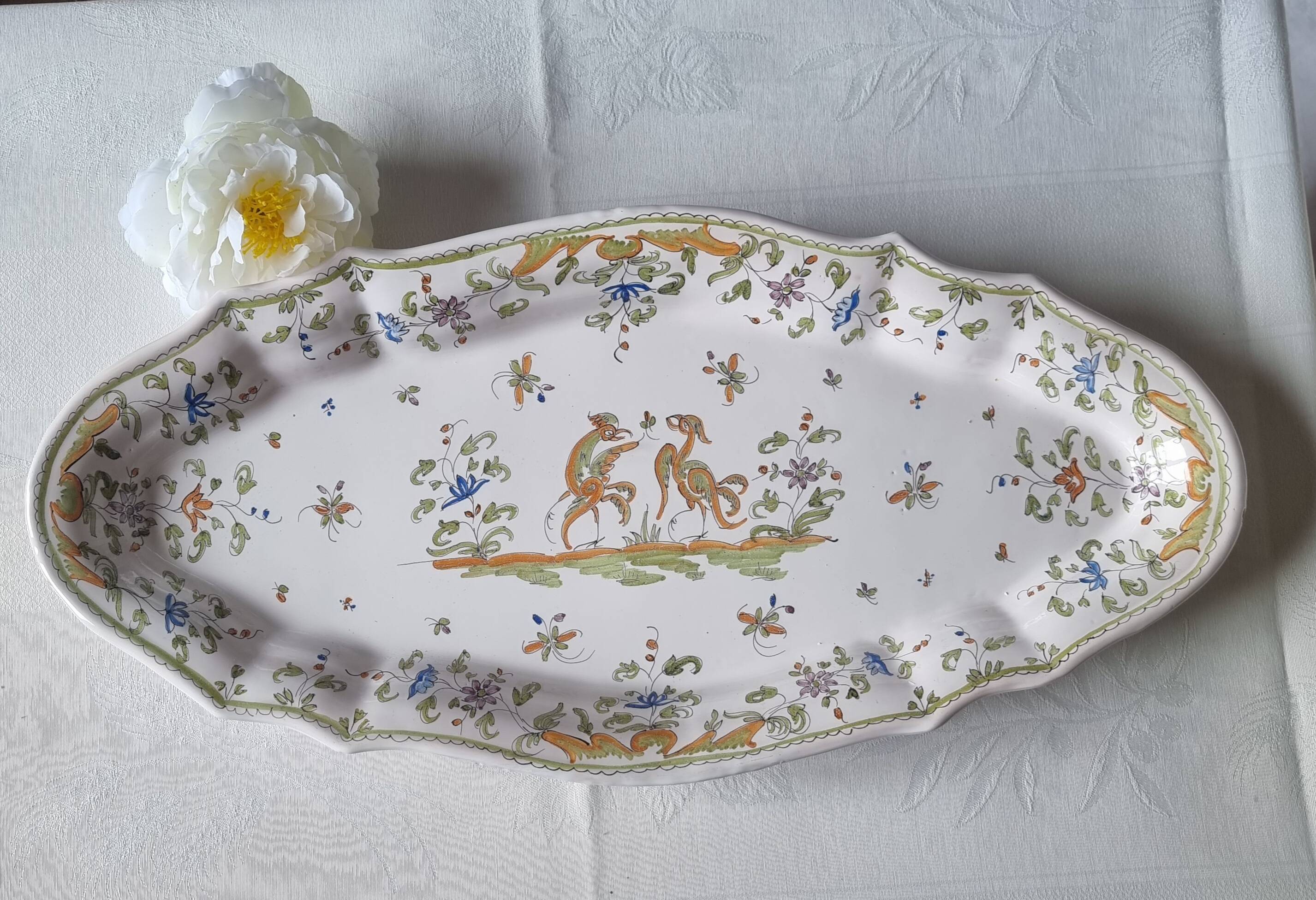 Large oval earthenware dish from Martres Tolosane, “Moustiers” model