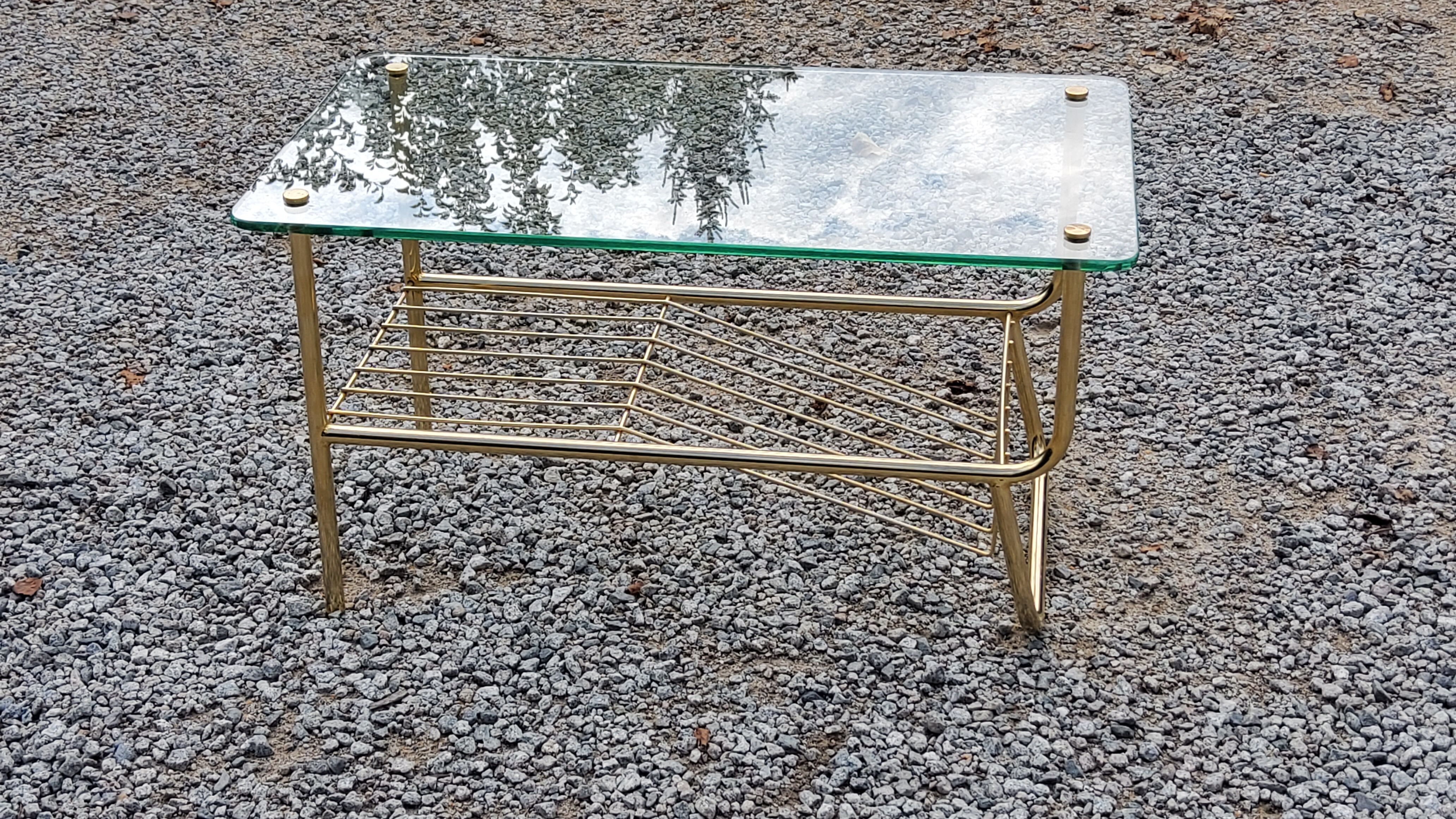 Coffee table from the 60s top glass base metal gilded
