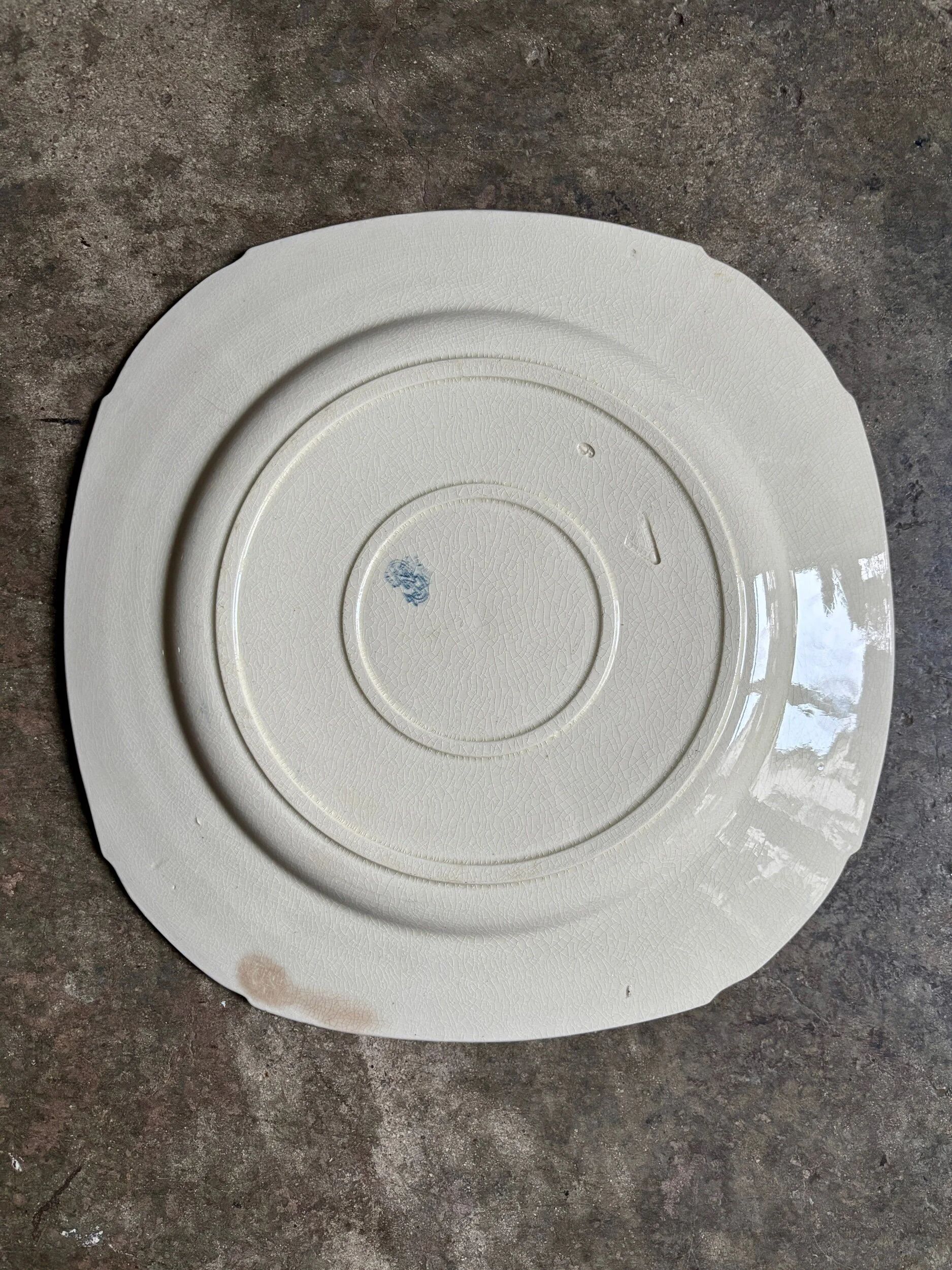 Square flat plate Gien in blue ironstone, service "Birds" around 1870.