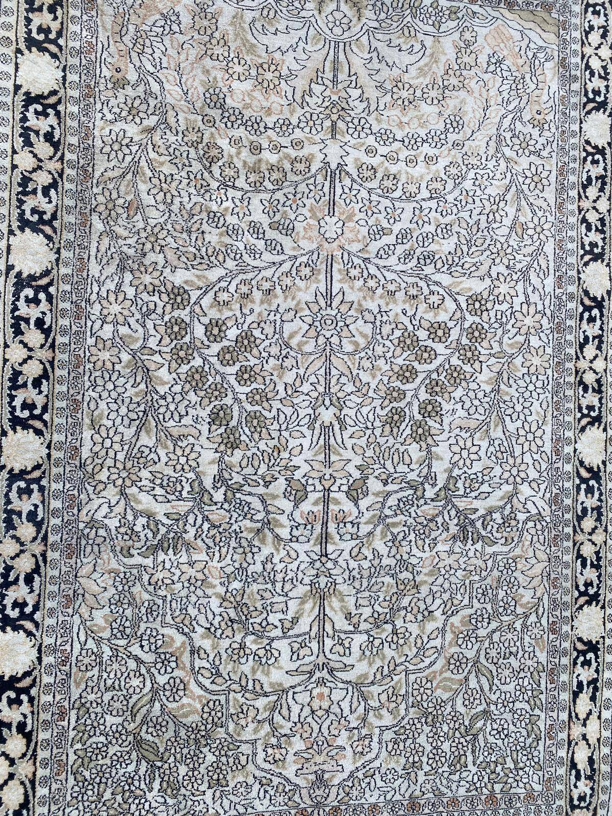 Handmade beige wool Persian rug 130x200