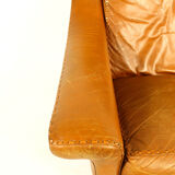 Matador swivel leather chair with ottoman by Aage Christiansen for Erhardsen & Andersen, 1960s