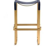 Pair of blue metal and brass stools without a backrest.