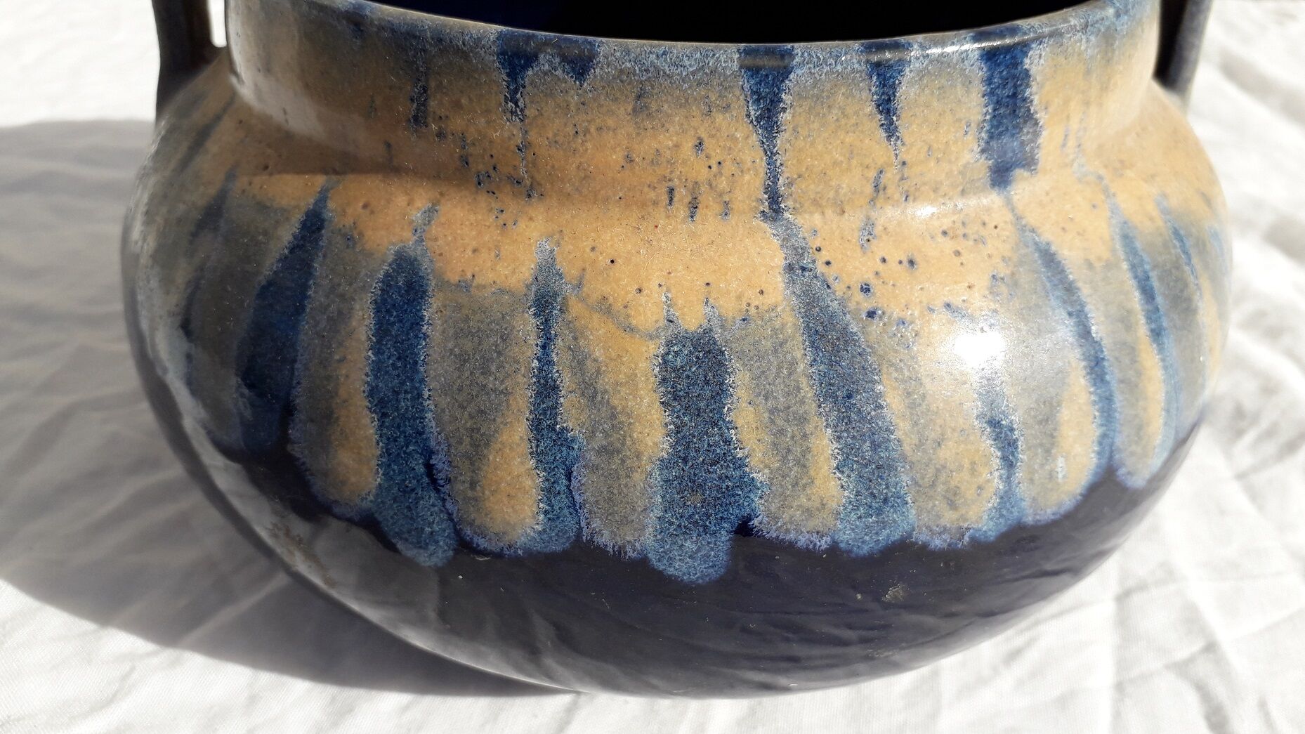 Signed stoneware pot cover