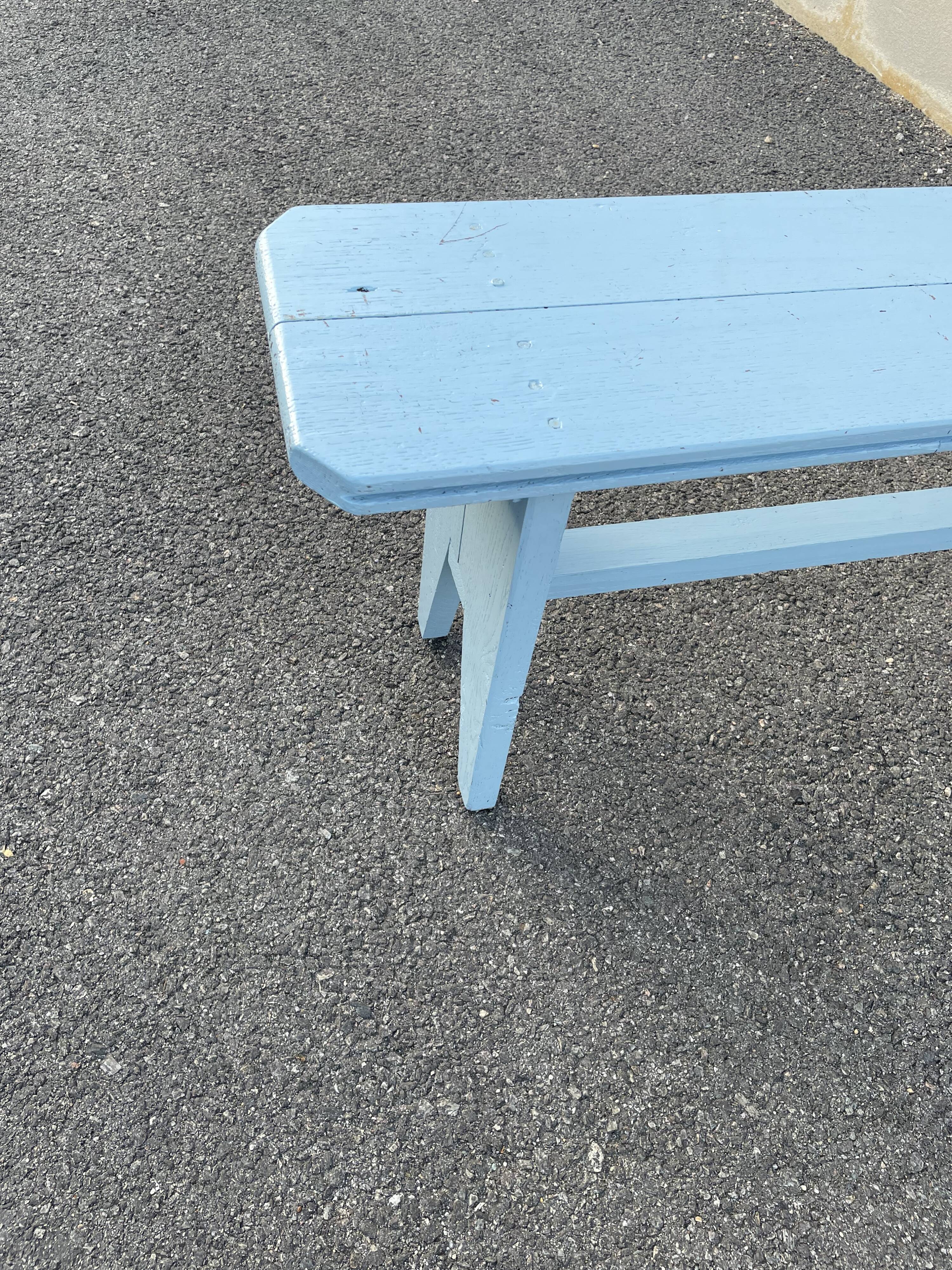 Blue painted wooden bench