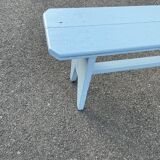 Blue painted wooden bench
