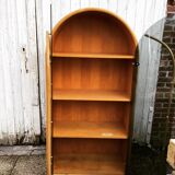 Curved bamboo and blond rattan library