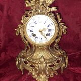 Clock, cartel in gilded bronze. Louis XV