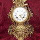 Clock, cartel in gilded bronze. Louis XV