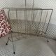 Vintage gold metal magazine rack