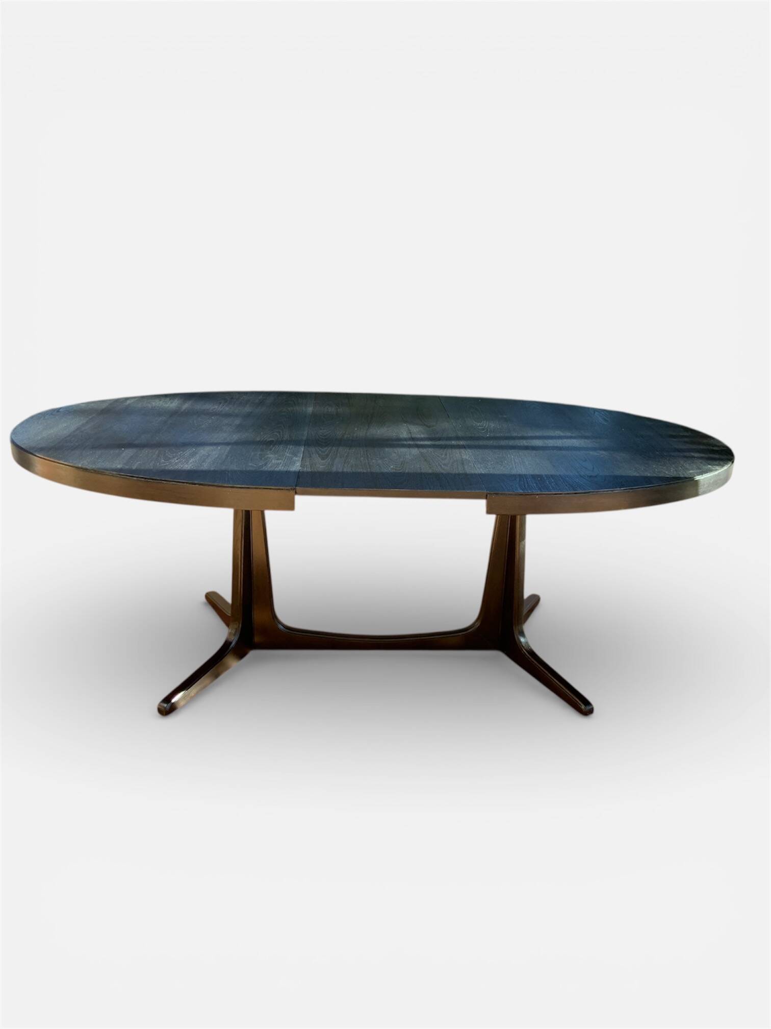Oval extendable dining table in the style of baumann — ebonised black — vi