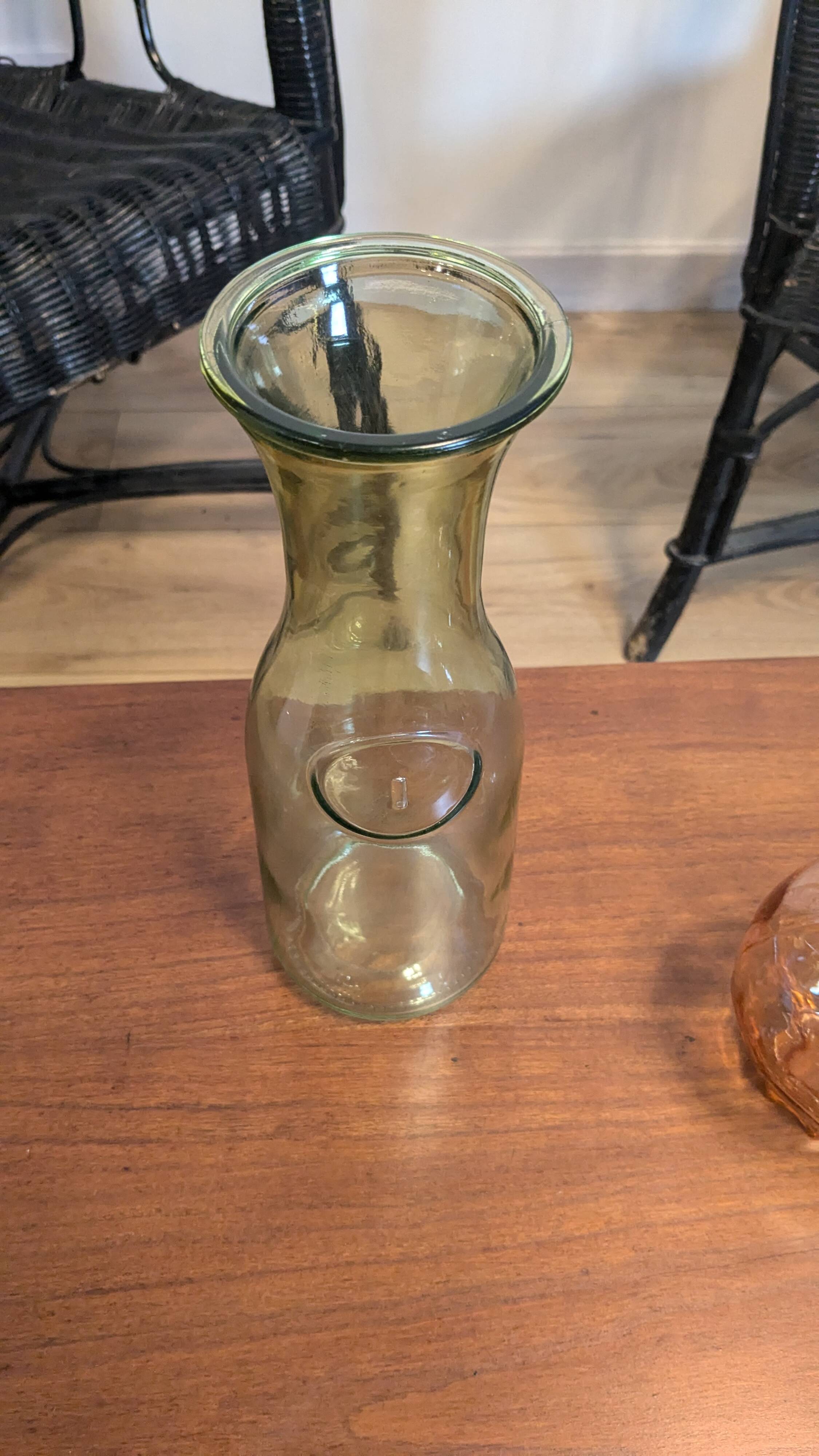 Old green milk bottle