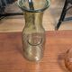 Old green milk bottle