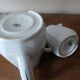 2 white porcelain milk jugs with platinum trim, Flora by Apilco.