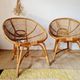 Pair of vintage basket chairs in rattan – Riviera style 1960