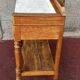 Walnut and marble dressing table, mercury mirror, circa 1850.