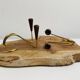 Pair of teak and brass candlesticks