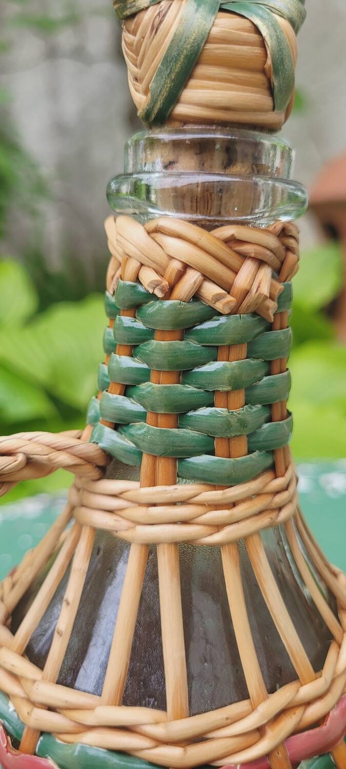 Glass and rattan carafe