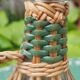 Glass and rattan carafe