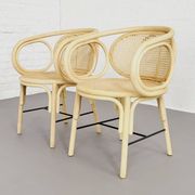 Paire de fauteuils en rotin et cannage