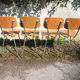 4 old chairs and an extendable table in 'faux wood' formica.