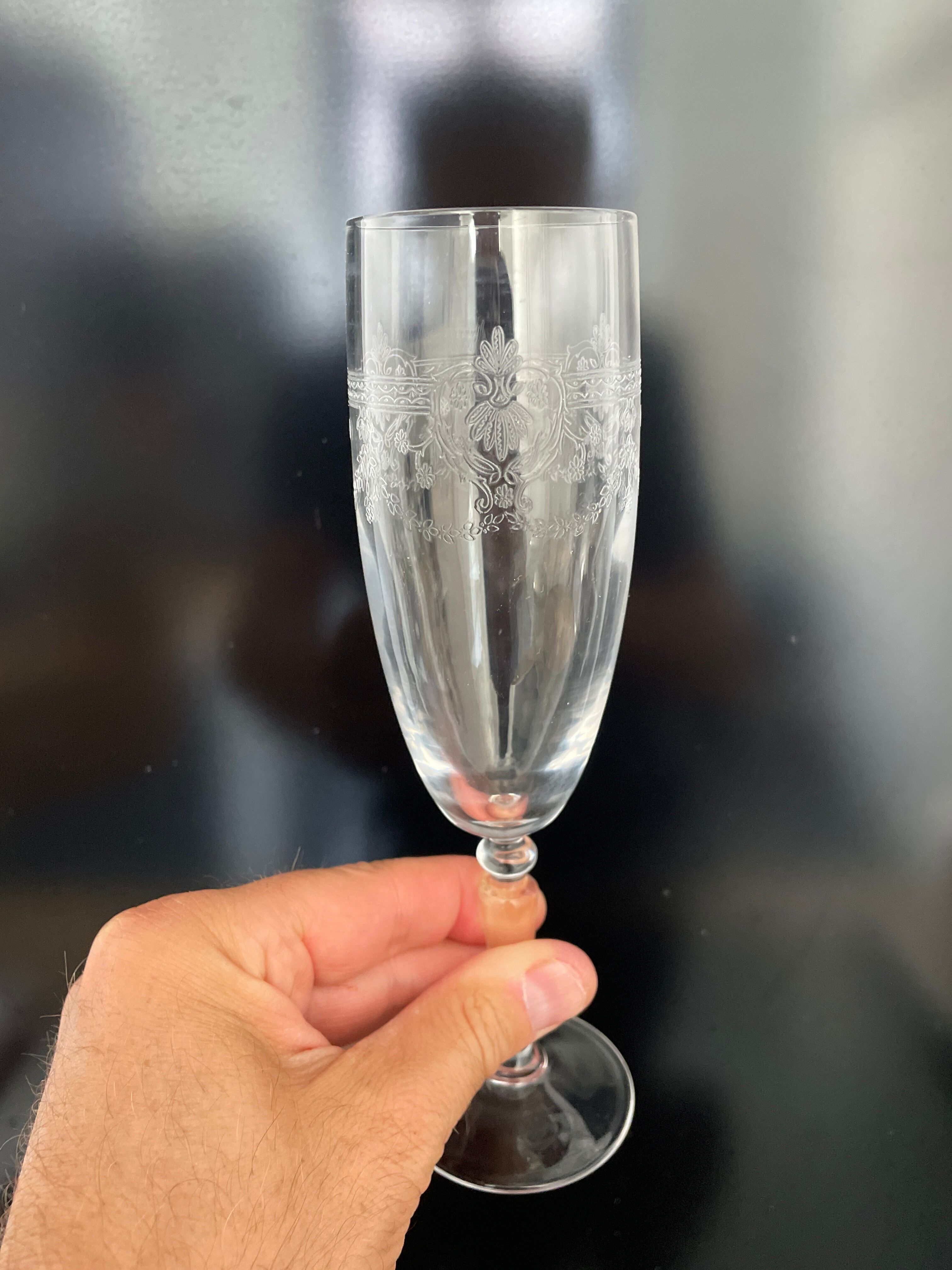 Set of 10 antique champagne glasses in engraved crystal