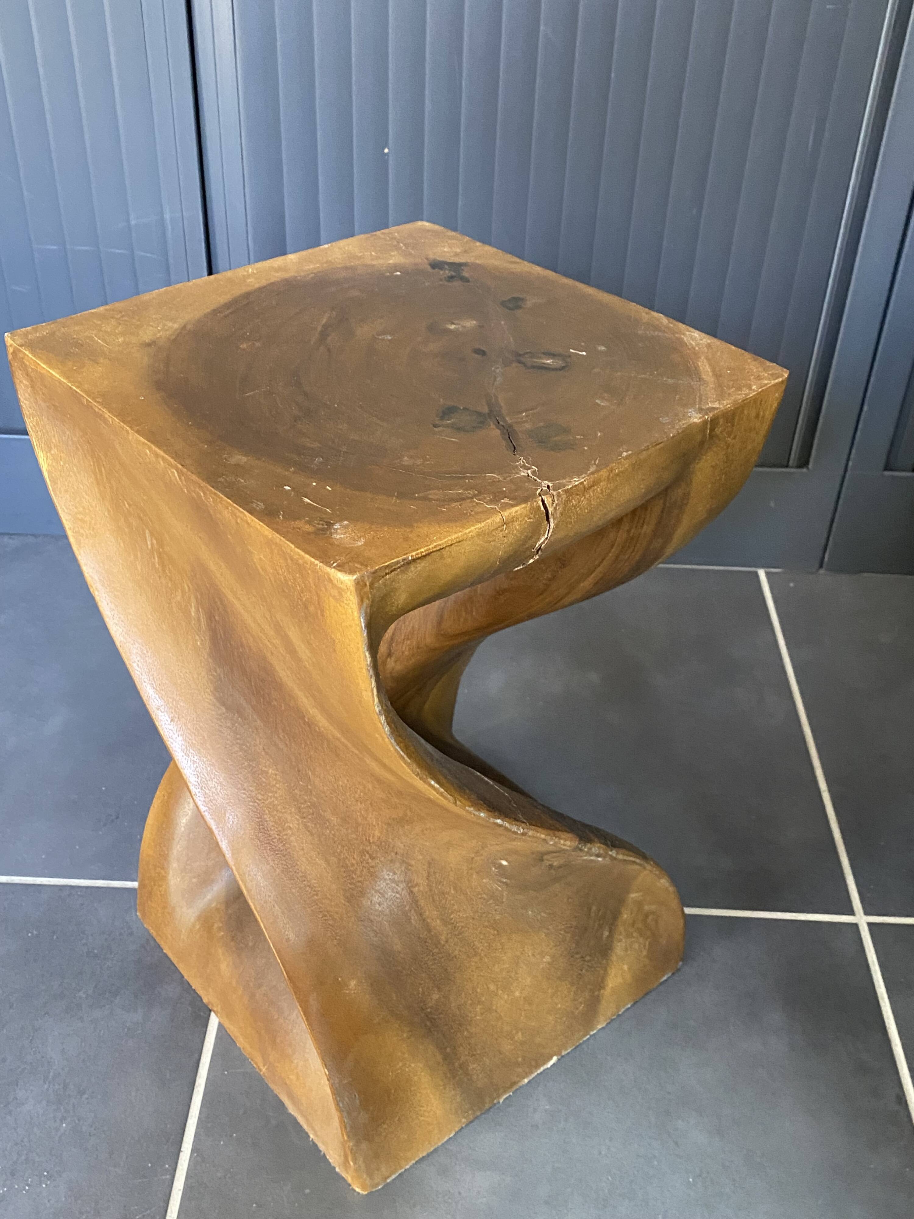 Stool n2 in solid raw walnut wood carved from the mass 1970