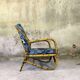 Fauteuil vintage en rotin et tissu à fleurs