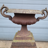 Cast iron garden urn on pedestal with handles