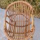 Set de trois fauteuils en rotin.
