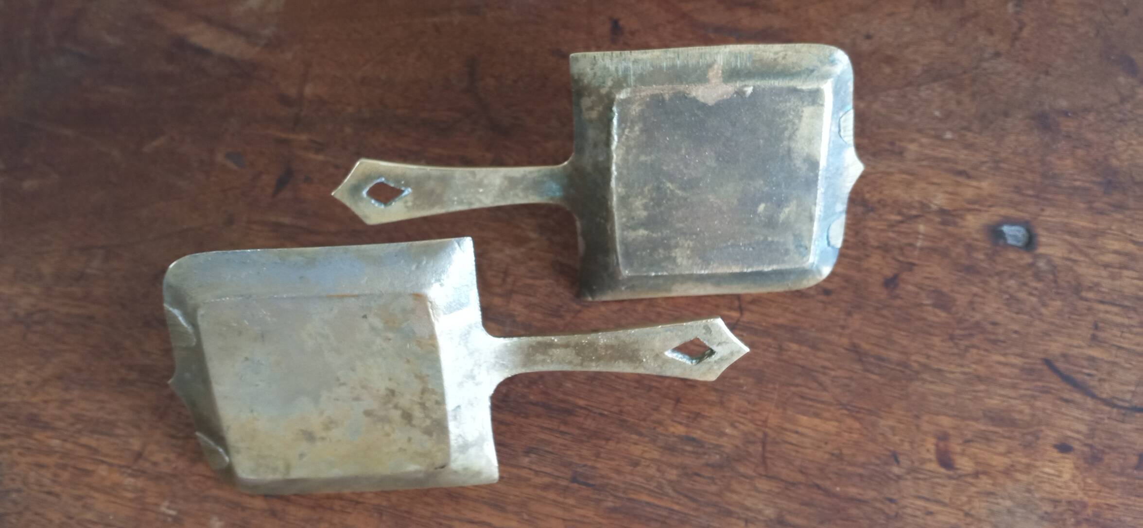 Pair of bronze candlesticks, fleur-de-lis