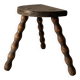 Wooden bench with three twisted legs