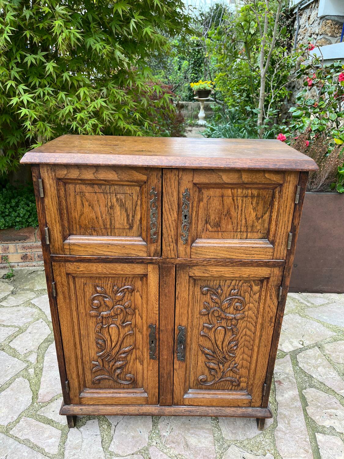 Low carved wooden sideboard