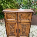Low carved wooden sideboard