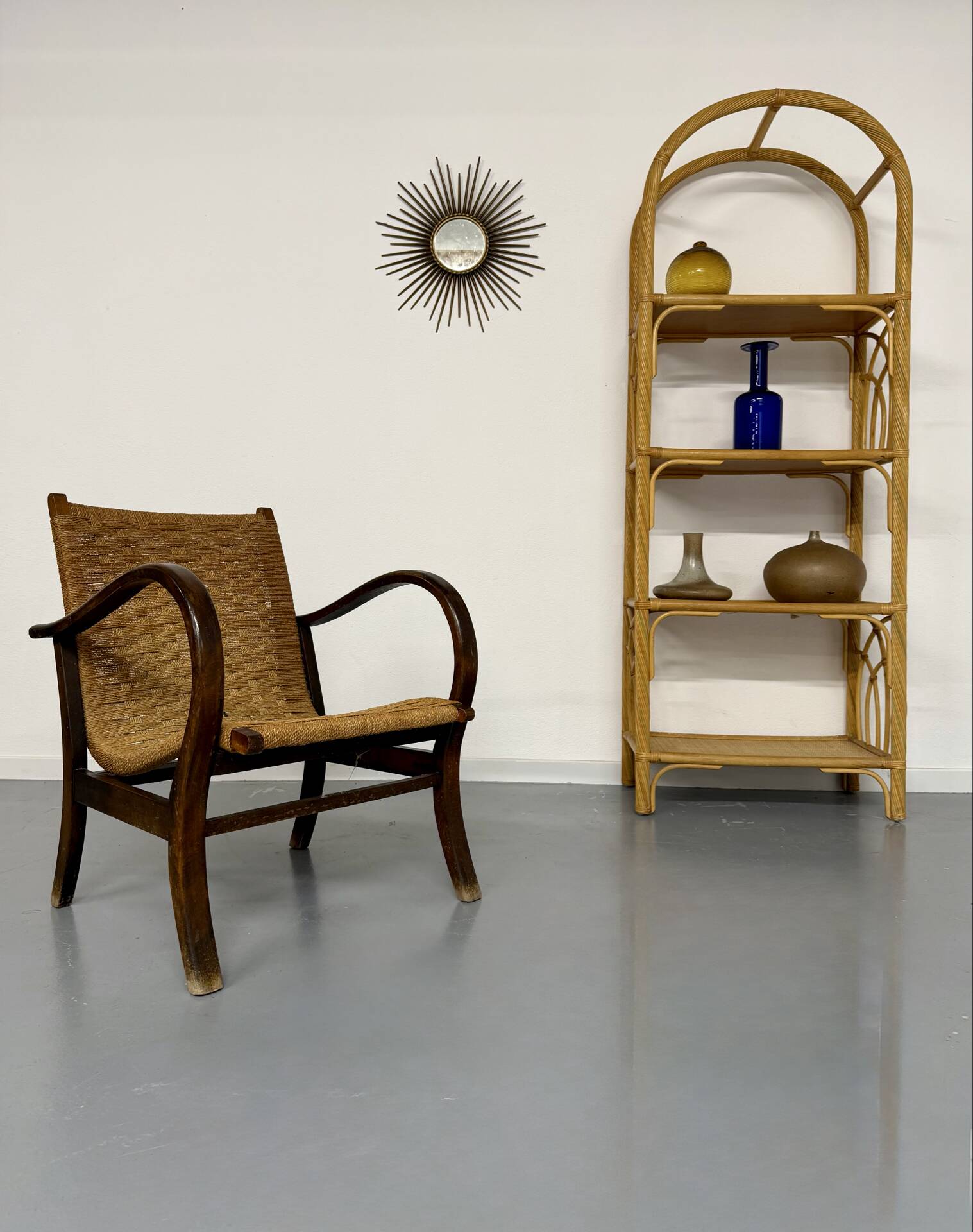 Large woven rattan bookshelf designed in the 1970s.