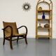 Large woven rattan bookshelf designed in the 1970s.